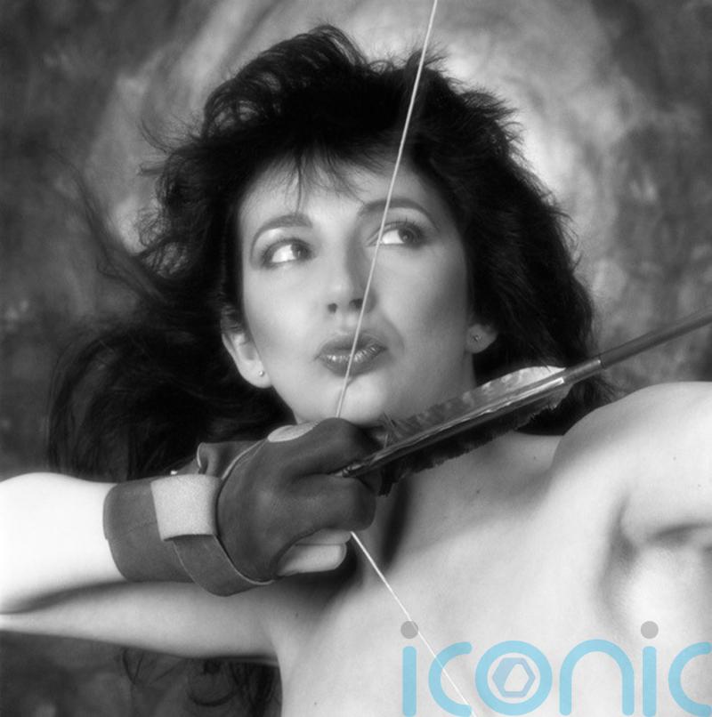 Kate Bush breaks trio of chart records as Running Up That Hill claims top spot