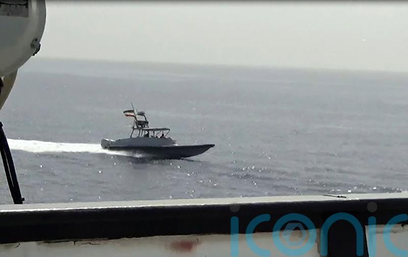 US warship fires warning flare during tense encounter with Iranian vessel
