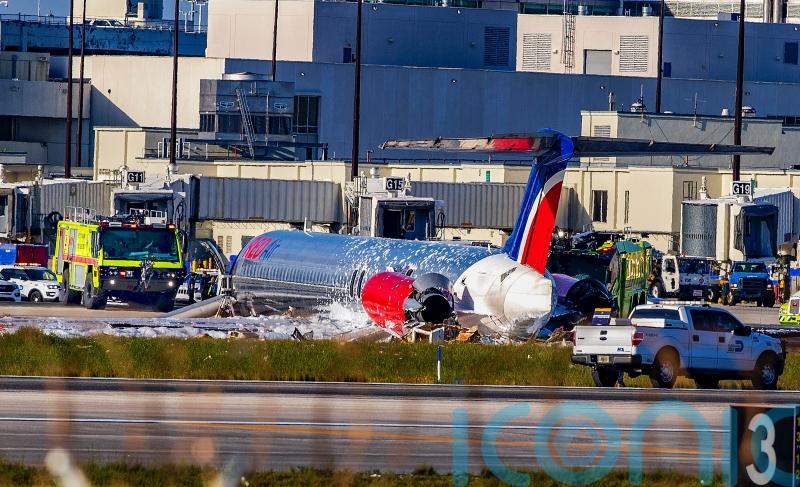 Three hurt as jet crash lands and catches fire in Miami