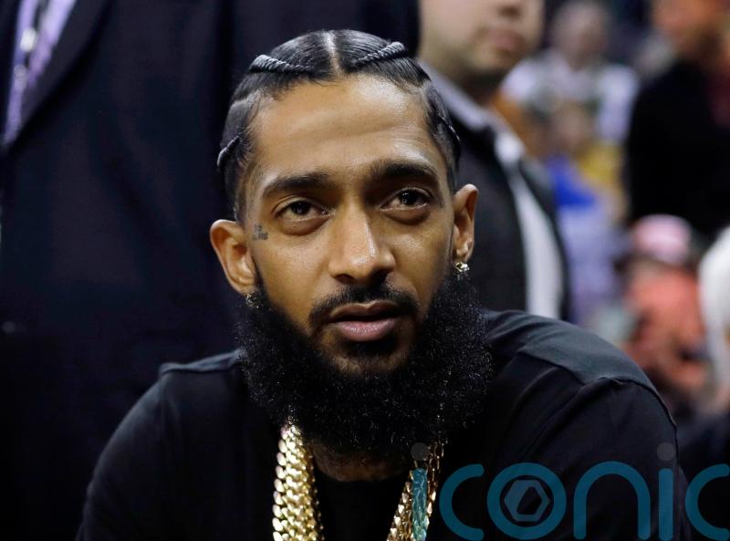Witnesses drag feet at trial of man accused of shooting rapper Nipsey Hussle