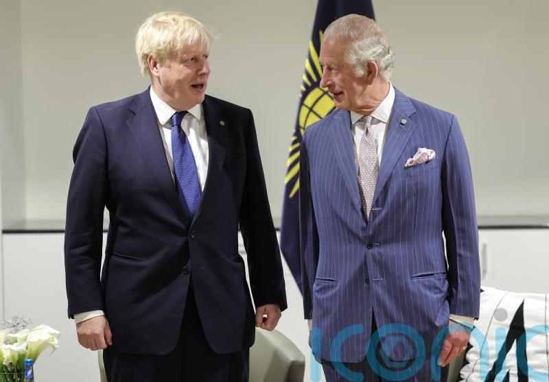 Boris Johnson and Charles all smiles in Rwanda as they enjoy ‘tea and catch up’