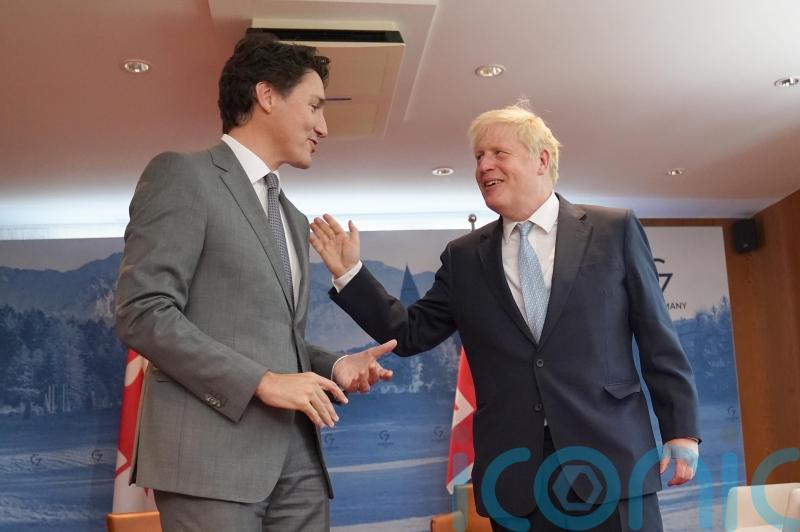 Johnson and G7 leaders joke about Putin during official meeting