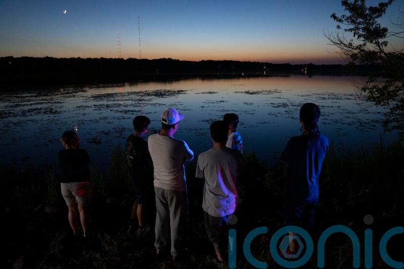 Bodies of two of three missing children found in Minnesota lake