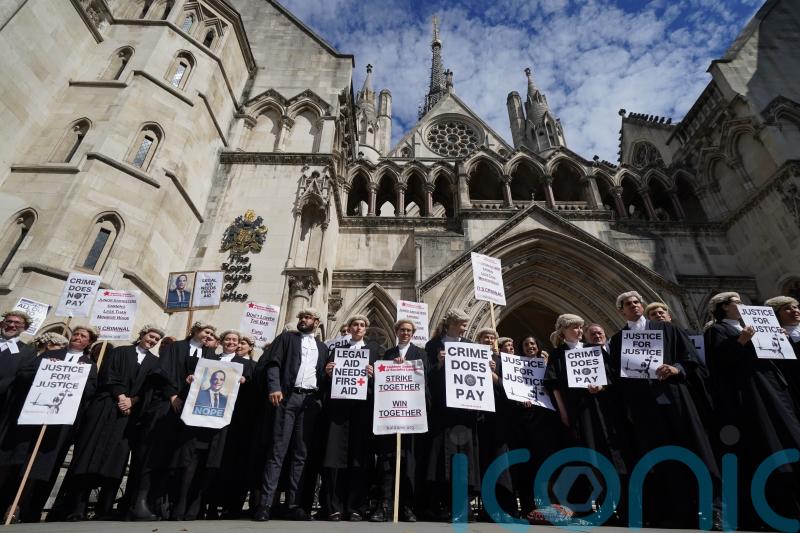 Criminal courts face disruption as barristers strike for second week