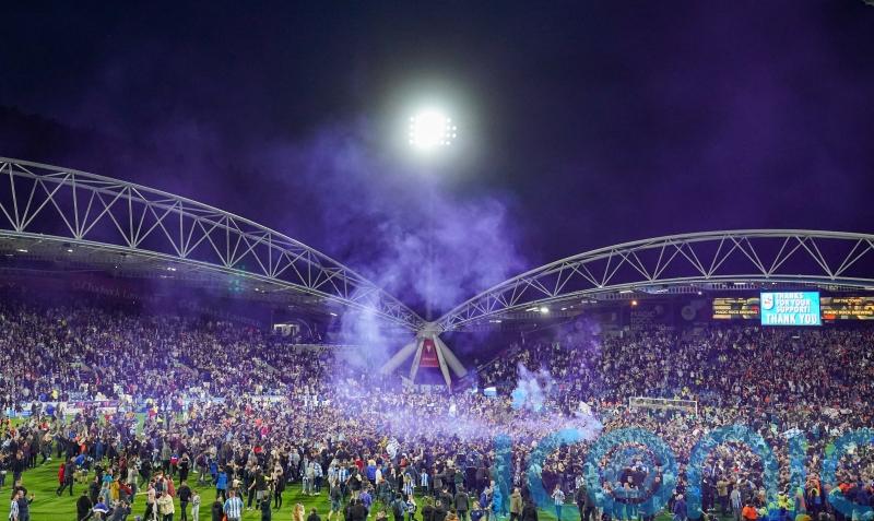 Huddersfield charged by FA after fans invaded pitch in play-offs against Luton