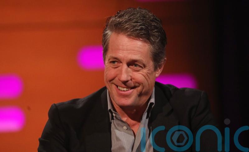Hugh Grant behind Benny Hill theme tune being played in Westminster