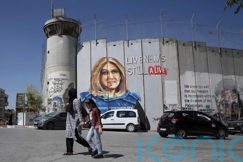 Loved ones of journalist killed in West Bank lash out at US President Joe Biden