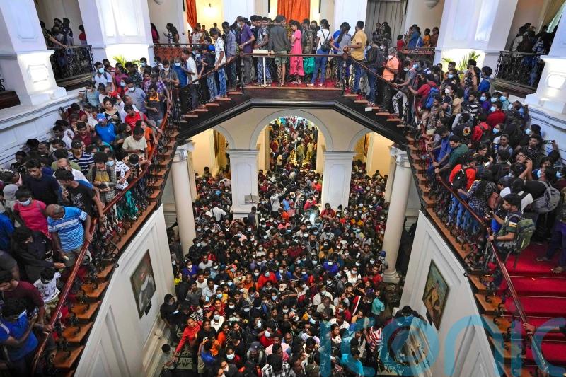 Sri Lanka’s political chaos persists as crisis talks to replace leader go on