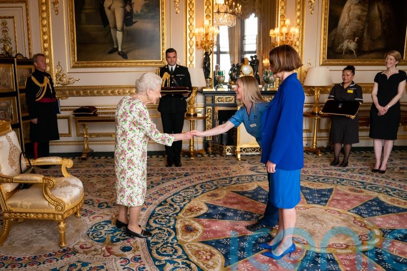 Nurse accepts George Cross award on behalf of NHS Scotland