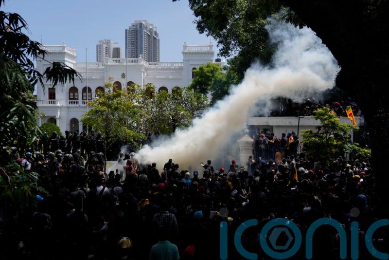 President flees Sri Lanka amid crisis as ire turns toward PM