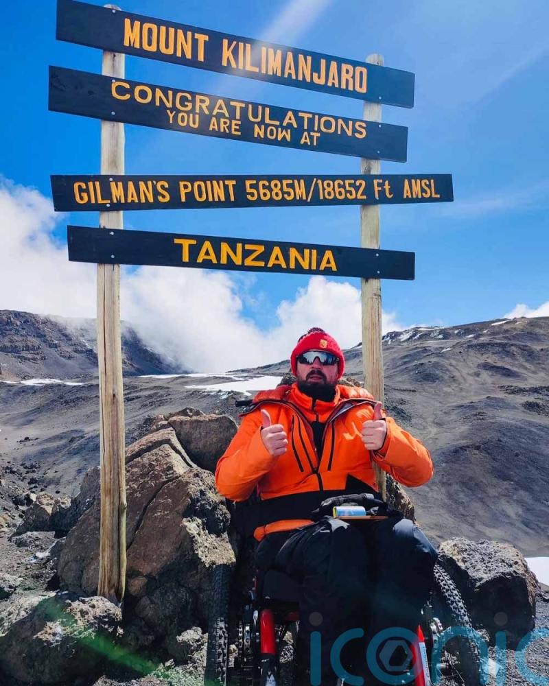 Dad who was the closest person to the Manchester Arena bomb to survive climbs Kilimanjaro and says ‘don’t write me off because I’m in a wheelchair’