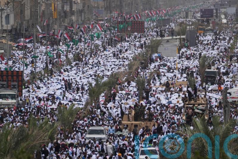 Tens of thousands attend prayers called by controversial Iraqi cleric