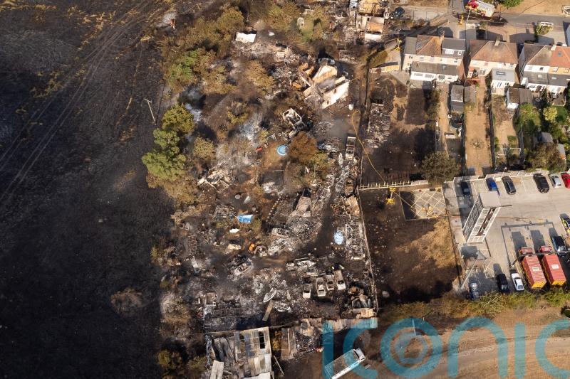 Storm warning after record heat led to firefighters’ busiest day since wartime