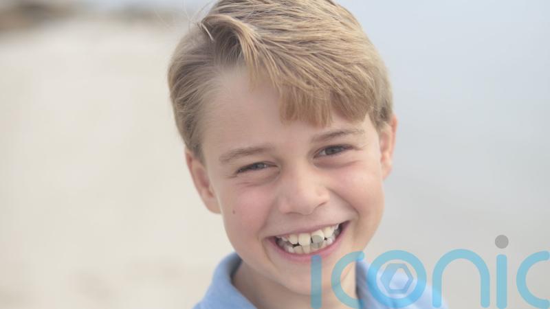 Beaming Prince George photographed by Kate for his official birthday picture