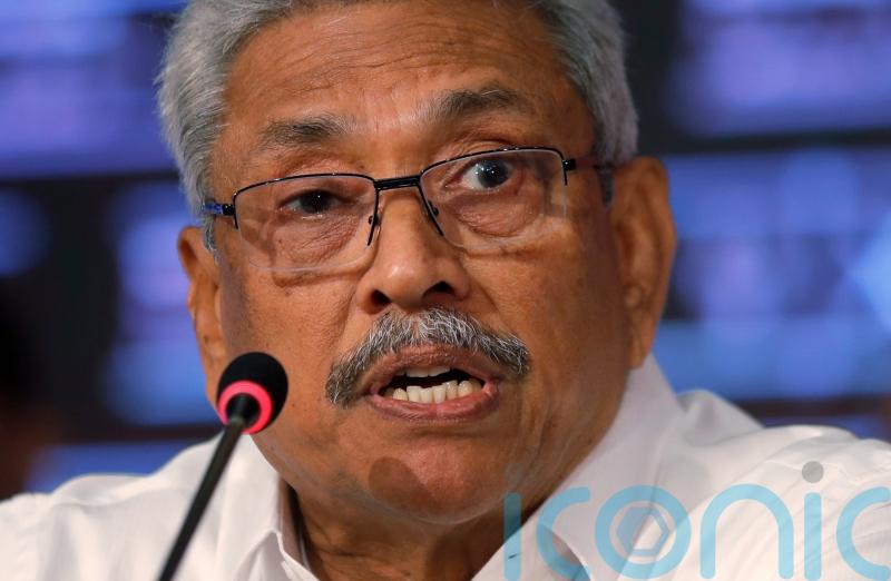 Human rights group seeks ex-Sri Lankan president’s arrest in Singapore
