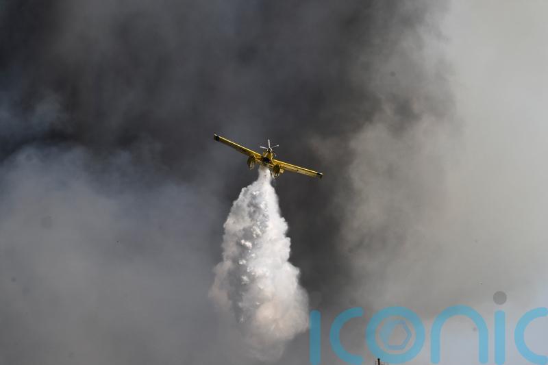 Homes saved as firebreaks halt blaze on Greek island