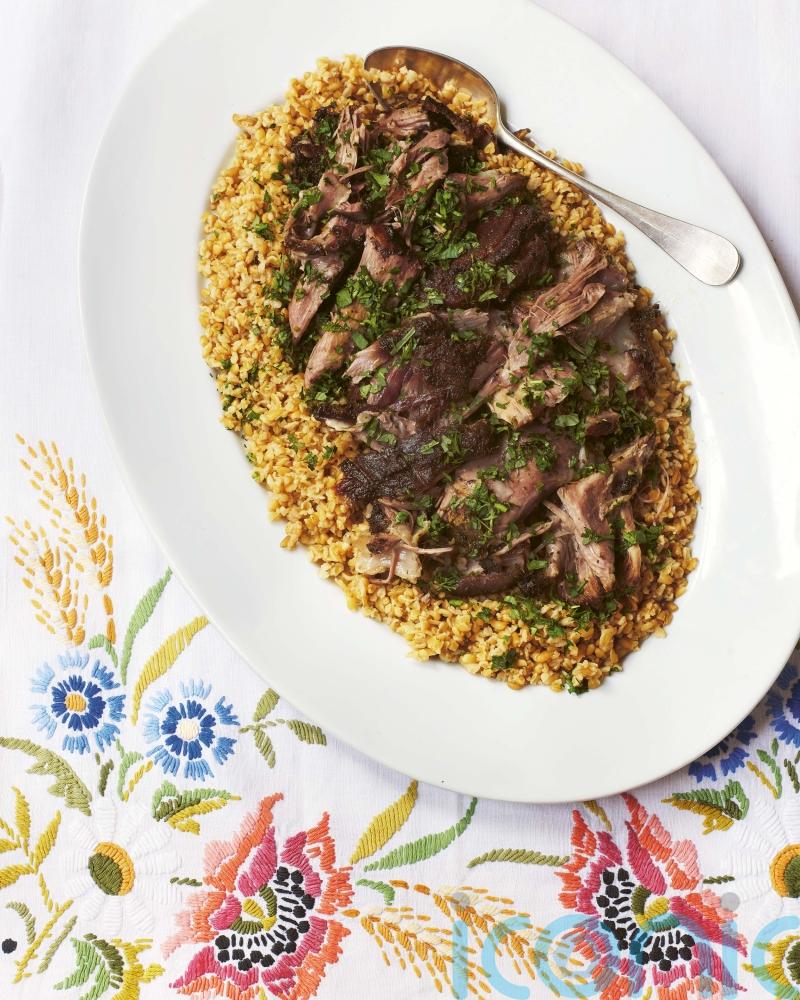 Olia Hercules’ lamb shoulder with herbs and preserved lemons recipe
