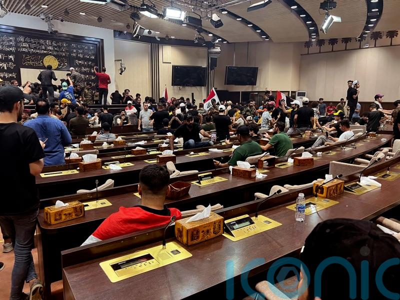 Demonstrators enter Iraqi parliament in protest over selection of nominee for PM