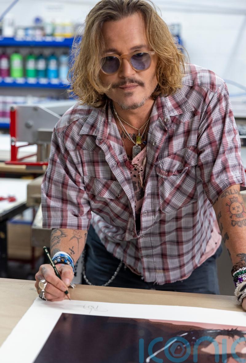Johnny Depp raises around £3m through sale of debut art collection