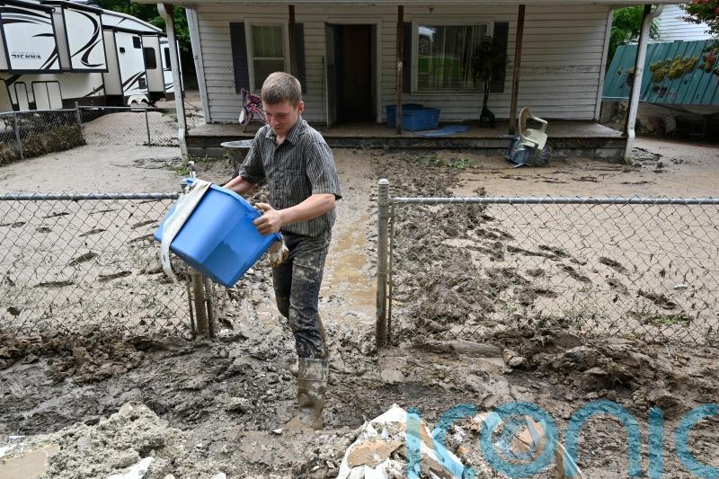 Appalachia residents begin clean-up after deadly floods