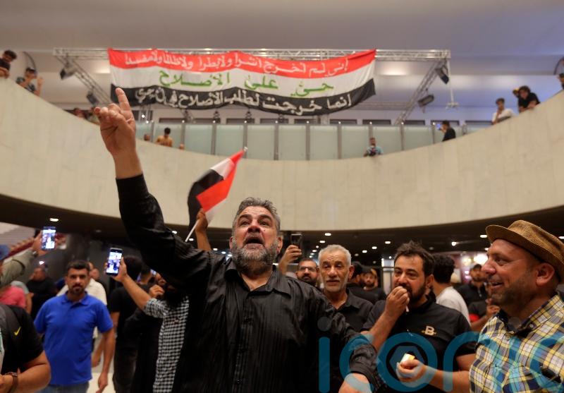 Iraqi protesters camp out in parliament for second day