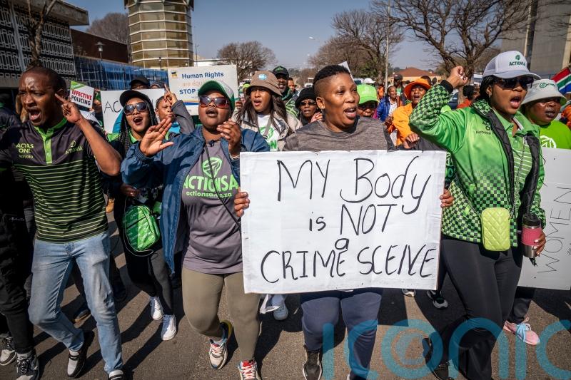 More than 80 men appear in South African court over gang rapes of eight women