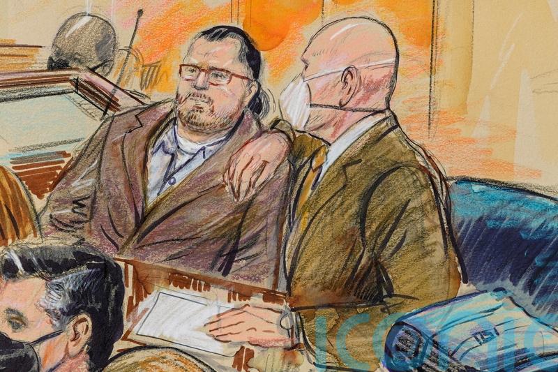 Man who stormed US Capitol with gun gets longest prison term