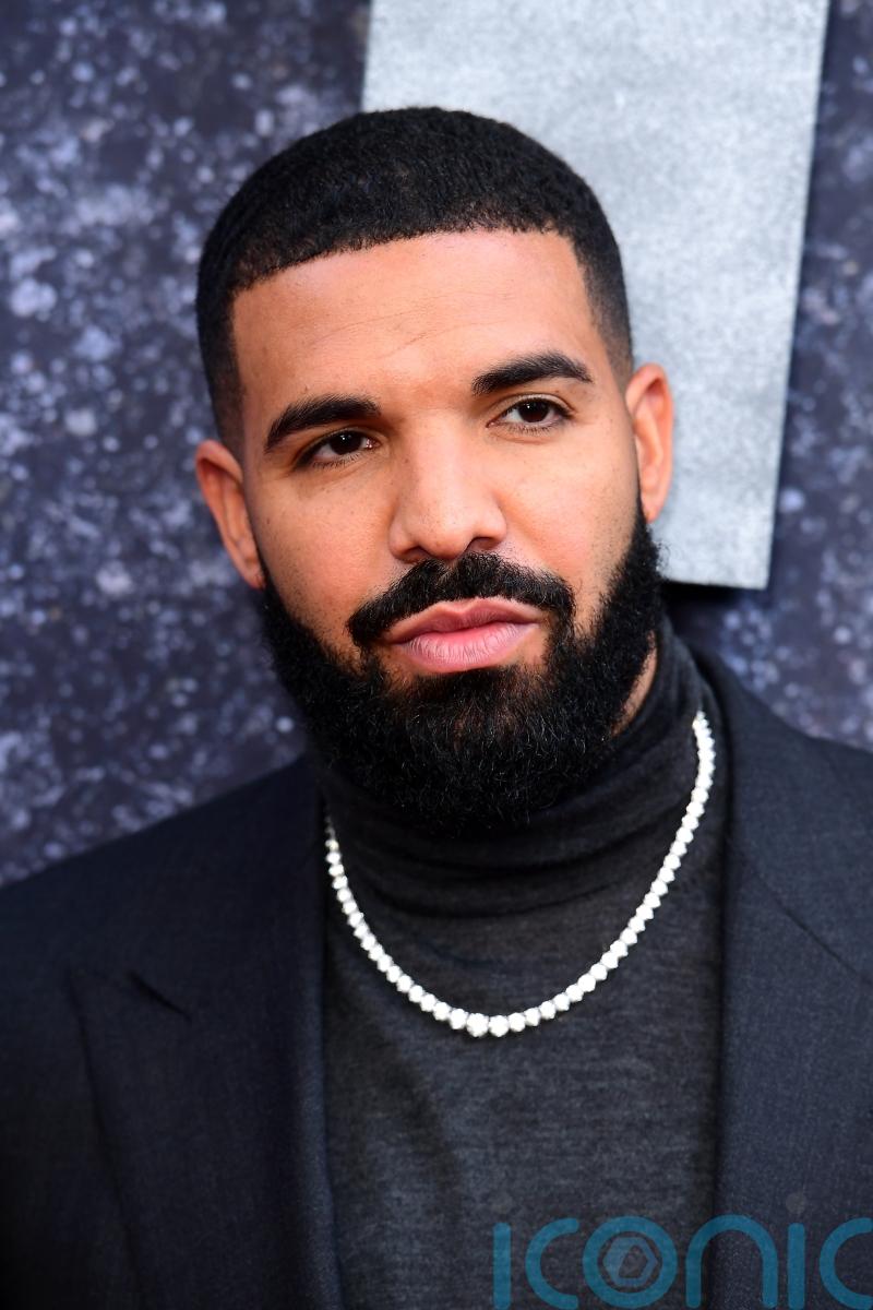 Drake postpones show with Lil Wayne after testing positive for Covid-19