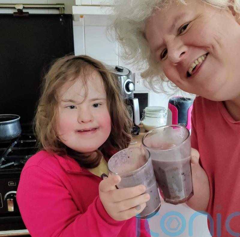 Loving mum of Down’s girl left with PTSD after treatment for everything from a heart defect to leukaemia praises charity for making her smile