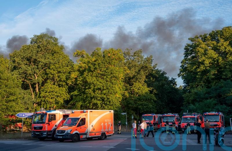Fire triggered by ammo dump explosions spreads in Berlin city forest