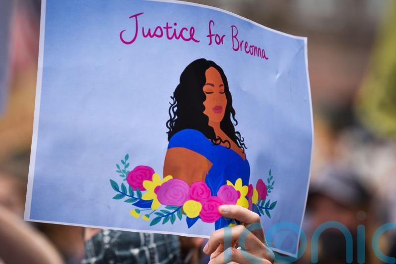 Four Louisville police charged over raid where Breonna Taylor was killed