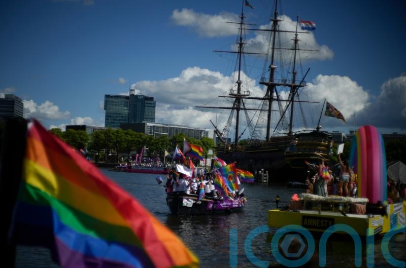 Huge crowds watch Amsterdam Pride’s canal parade celebration
