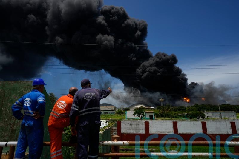 Firefighters battle big blaze at Cuba tank farm for second day
