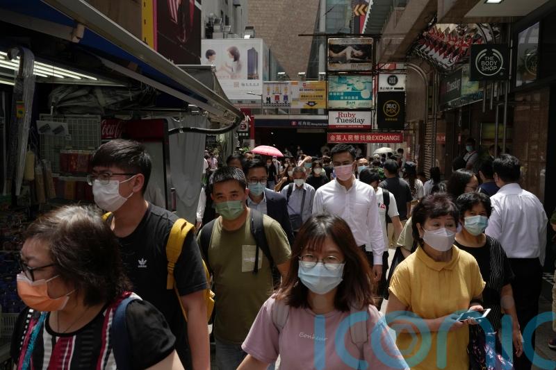 Hong Kong cuts Covid hotel quarantine for arrivals to three days