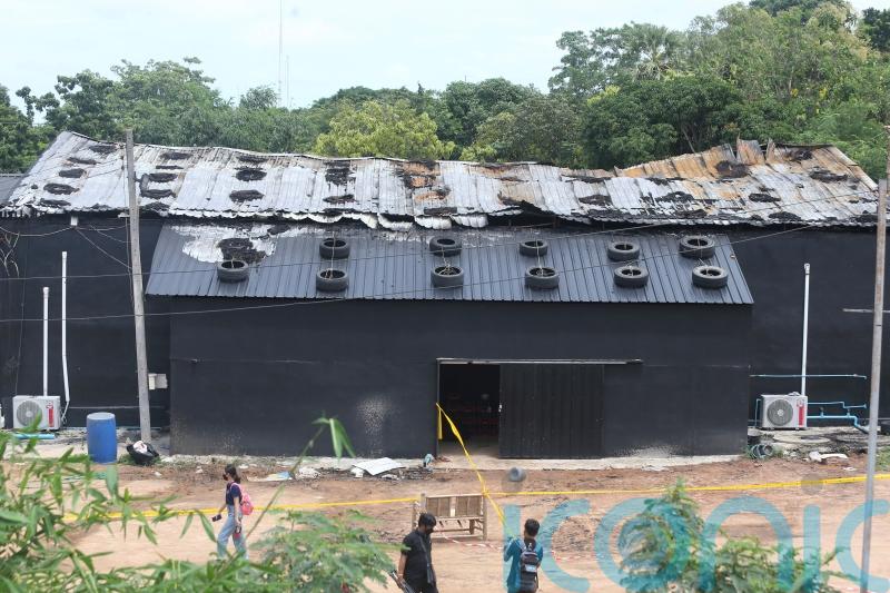 Thai pub owner charged in connection with deadly blaze