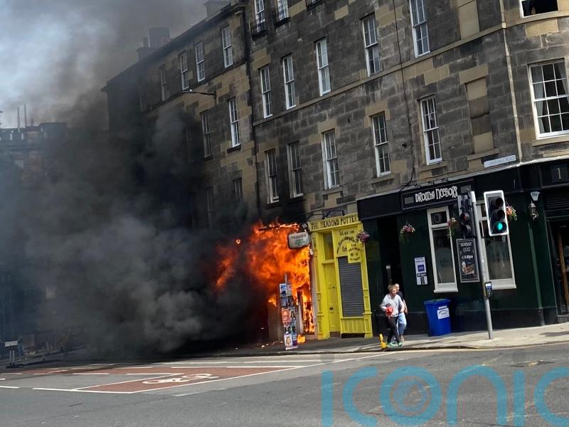 Three people treated by paramedics after fish and chip shop blaze