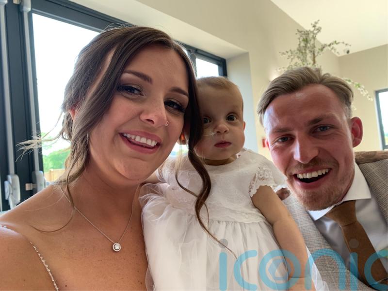 Newlyweds on tenterhooks as baby girl who had heart surgery 2 weeks ago awaits liver transplant with dad ready to be emergency living donor