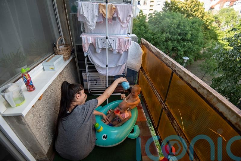 In Pictures: How people in Budapest are keeping cool amidst heatwave