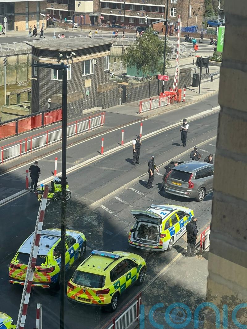 Pistol found at scene after man shot by police