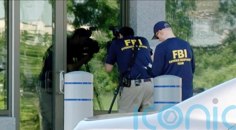 Suspect who tried to breach FBI office dies in stand-off