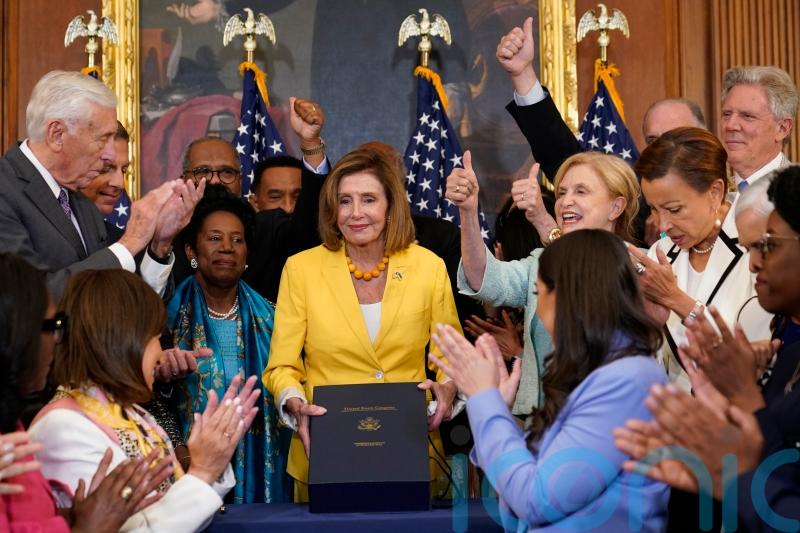 Democrats push landmark climate and health care bill through US Congress