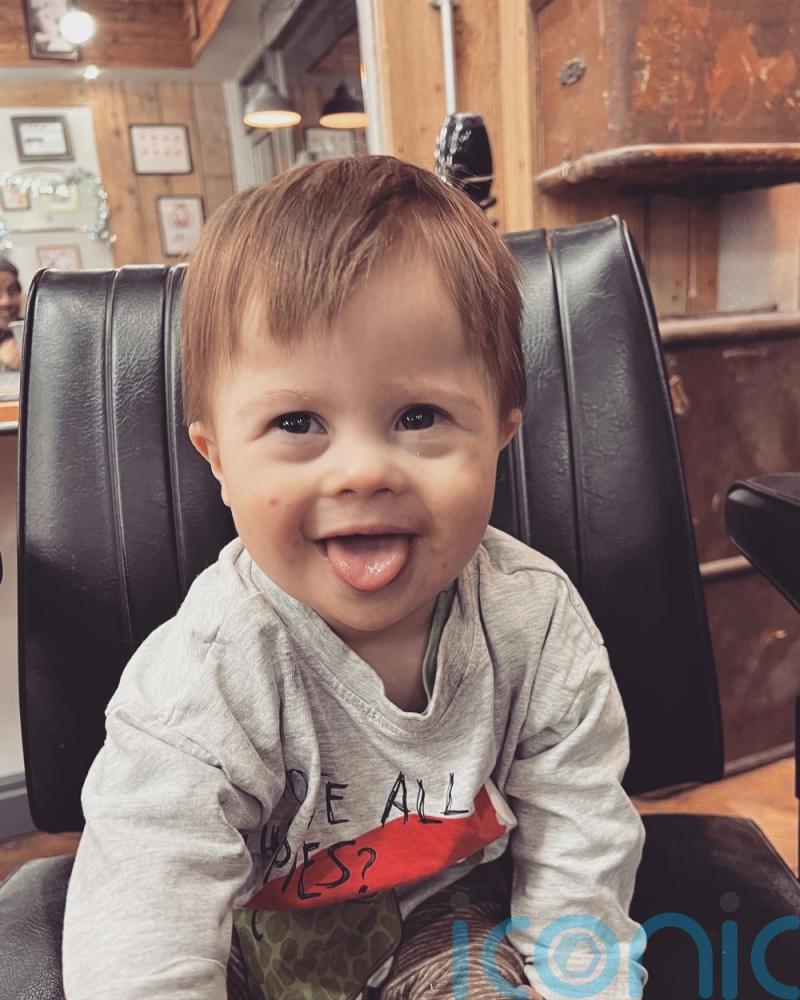 Adorable toddler feted as an actor and model will beam out from giant screens in NYC’s Times Square as face of a Down’s syndrome charity