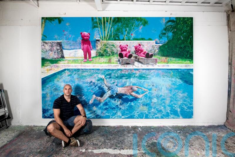 Photographing himself in a pink bear suit helped this man find “happy memories” after a break up and now his pictures sell for up to £40k