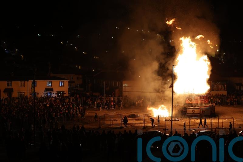 Police investigate reports of bangs and ‘hate crime’ at nationalist bonfire