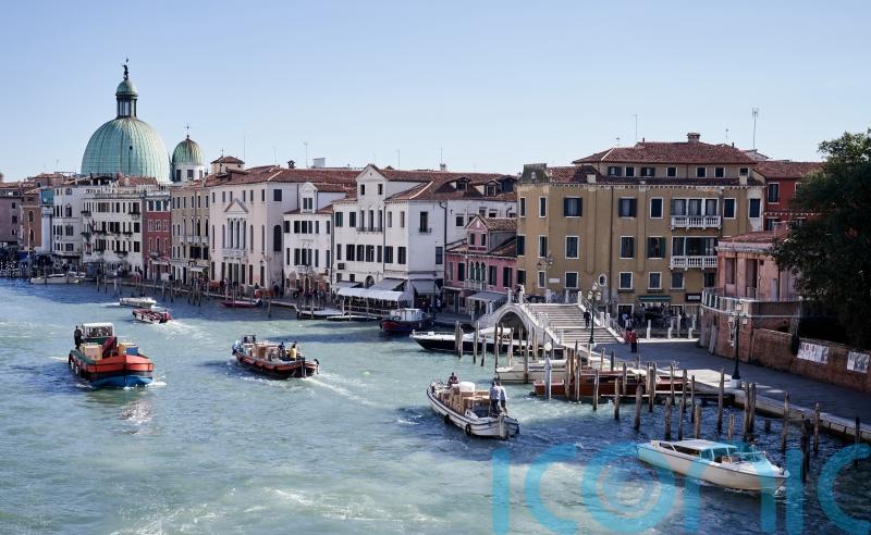 Venice mayor outraged at surfers motoring down Grand Canal