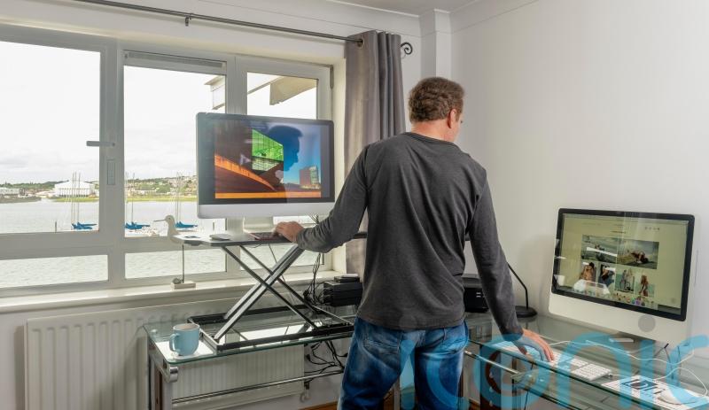 Standing desks ‘could cut sitting time by an hour a day’ for office workers