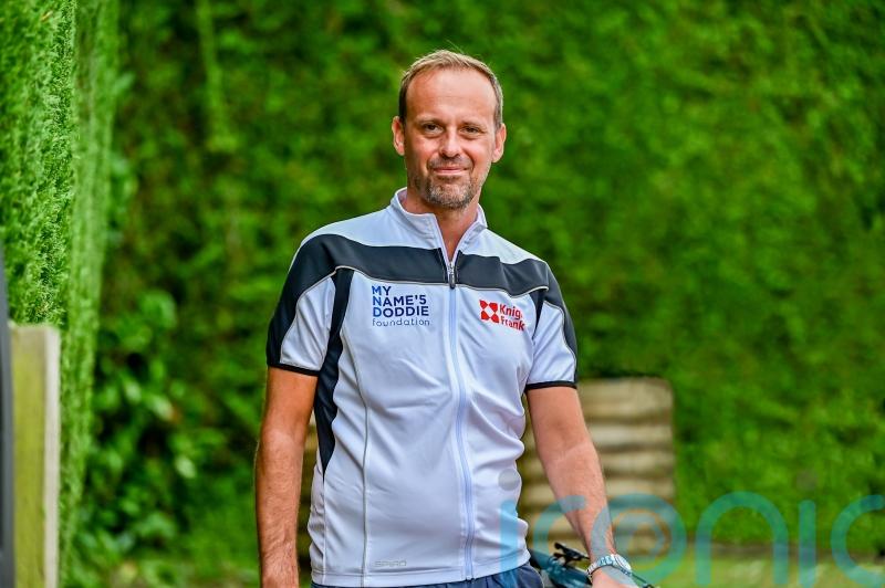 Sporty high-flyer diagnosed with MND after slurring making speeches raises £170K for research with 50 mile cycle backed by David Beckham
