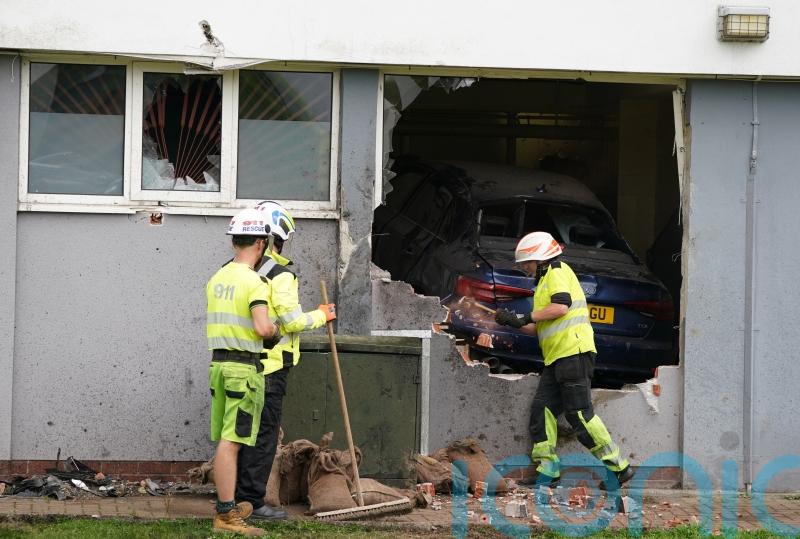 Driver arrested after car crashes through wall of Paisley flats