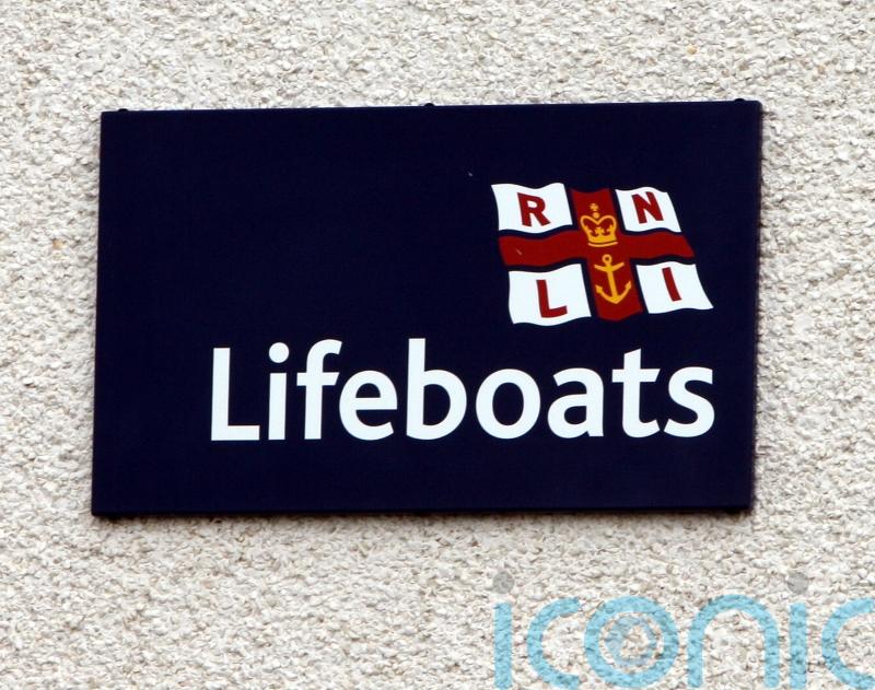 Girls rescued by lifeboat after becoming stranded on rocks