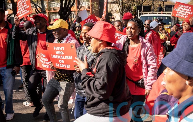 South African workers march in capital against inflation